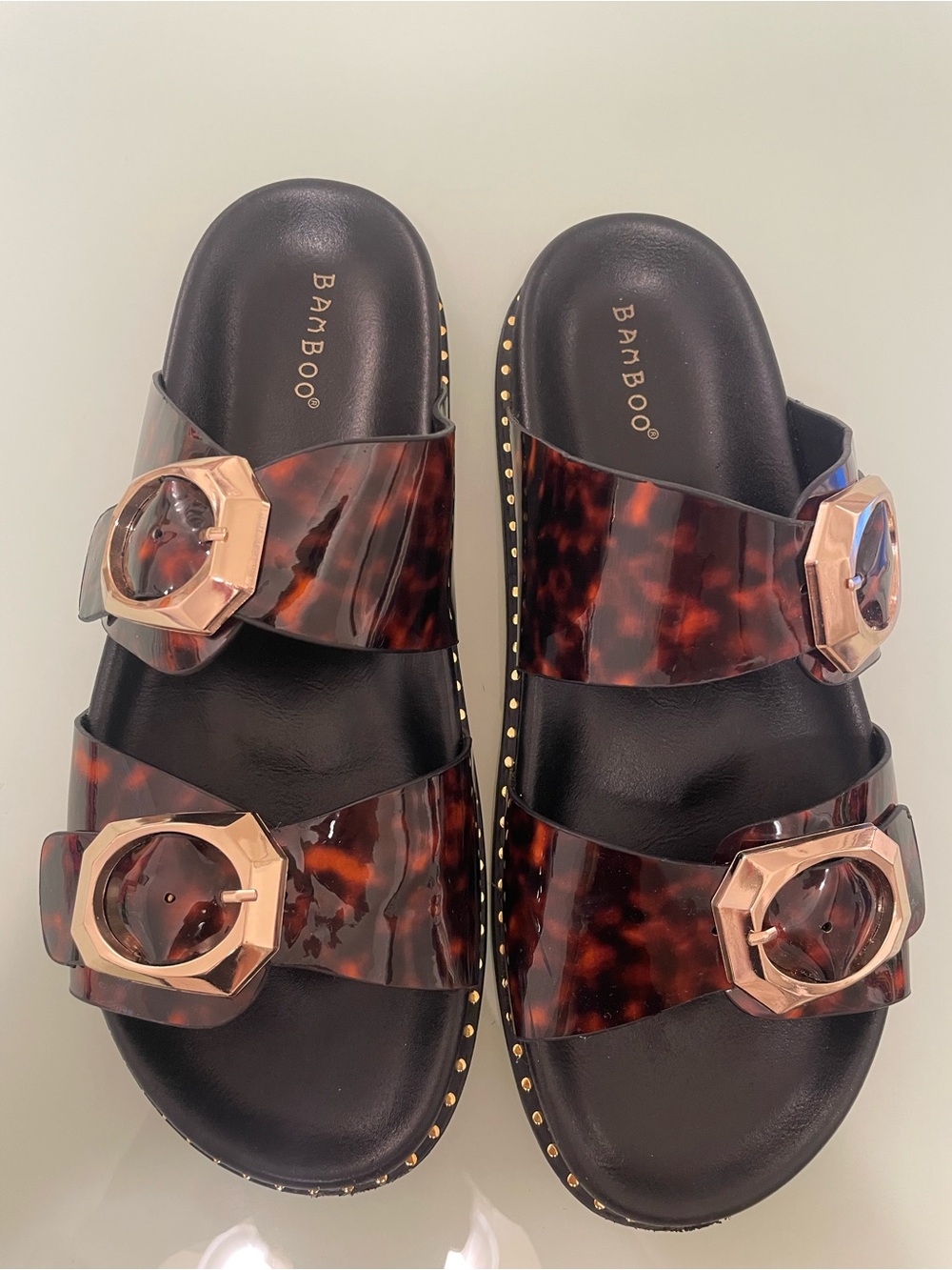 Women’s Tortoiseshell Slide Sandals with Gold Buckle